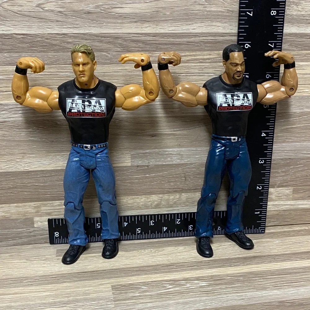 WWE Wrestling Action Figures with Black Shirts and Blue Jeans
